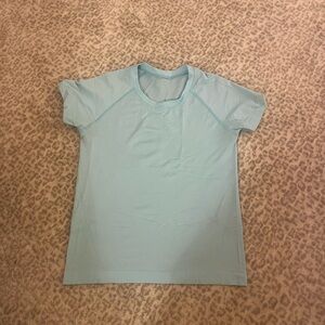Lululemon Teal swiftly tech!! Waist length- very rare color!!